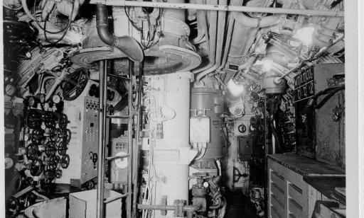 Black and white photo showing ladder leading to turret, periscope cylinder and voicepipe.