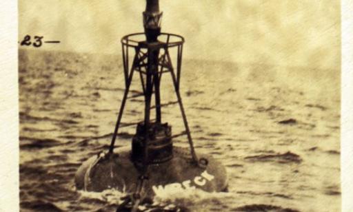 Yellowed black and white photo of a metal gas-powered buoy of the kind used on the St. Lawrence during this period.